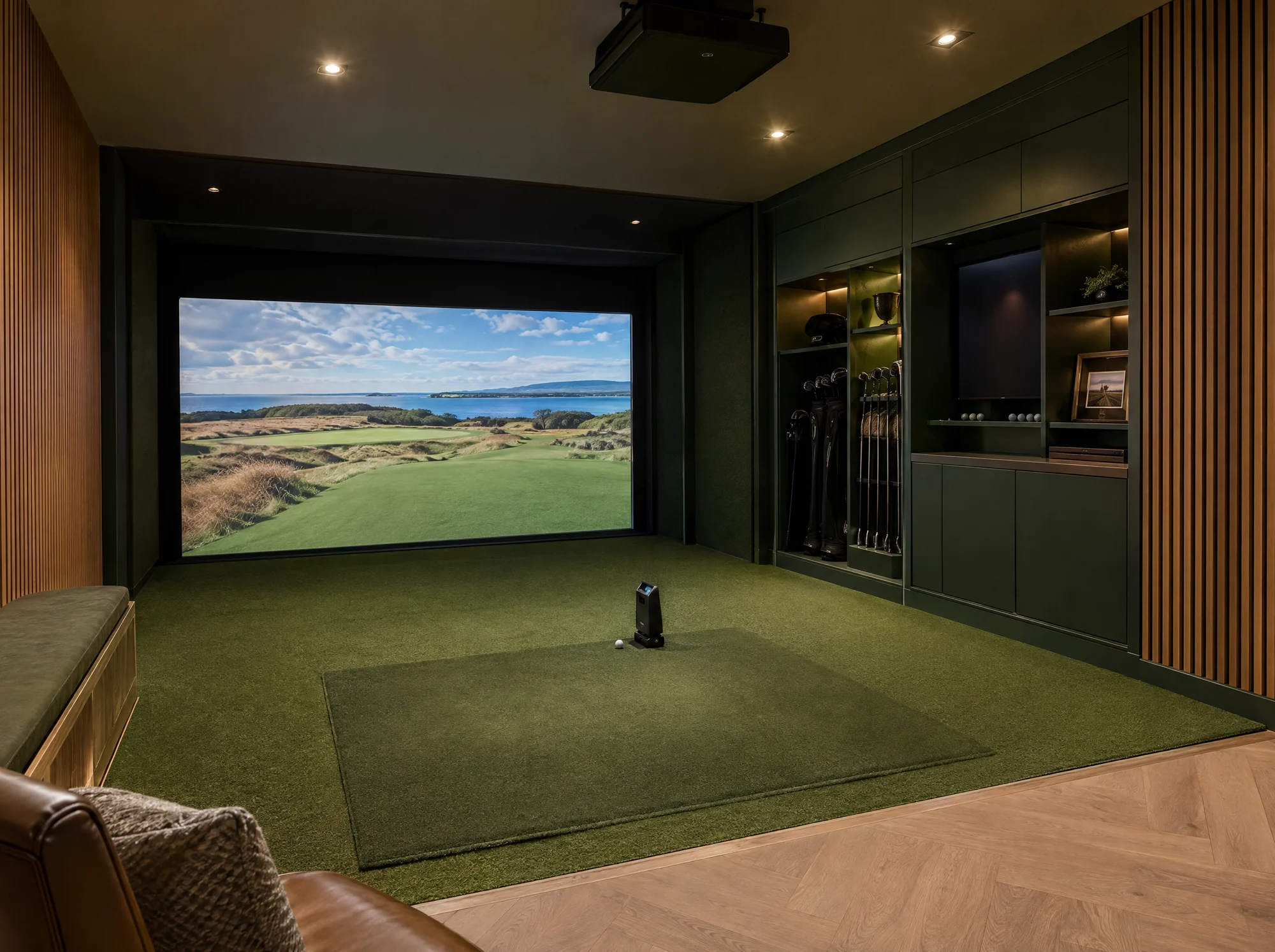Purpose-built golf simulator bay with dark acoustic finishes
